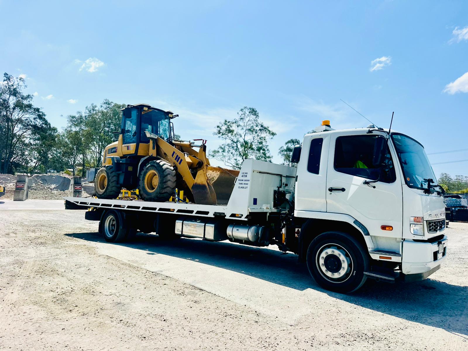 heavy duty tow truck for moving containers, construction equipment, and more